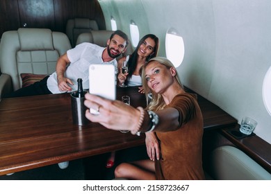 Group Of Friends Going On Vacation With A Private Jet