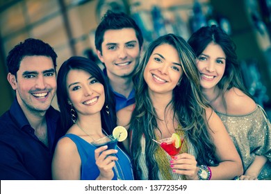 Group Of Friends Going Out To A Bar And Having Drinks