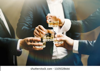 Group Of Friends Guys With Glasses Of Whiskey