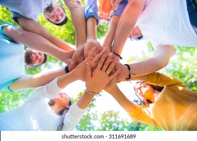 Group Of A Friends Hands Together