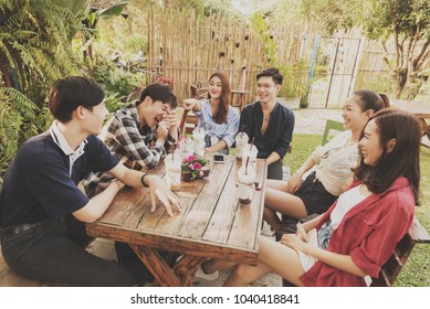 Group Of Friends Hang Out In Cafe