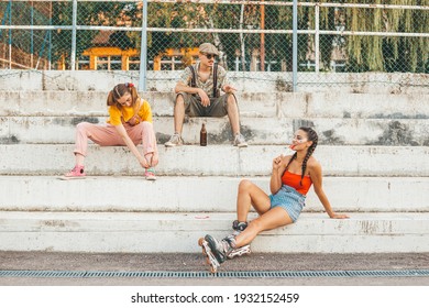 Group of friends hanging out outside. Chilling - Powered by Shutterstock