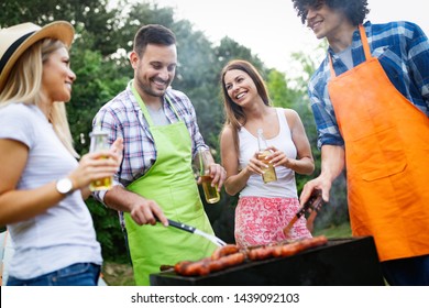 Group of friends having a barbecue party in nature