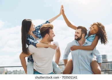 Group Of Friends Having Barbecue Party On The Roof