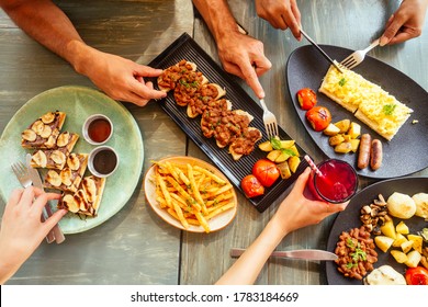 Group of friends having breakfast in the restaurant - Powered by Shutterstock