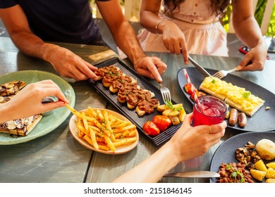 Group of friends having breakfast in the restaurant - Powered by Shutterstock