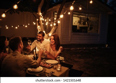 Group Of Friends Having Dinner Outside