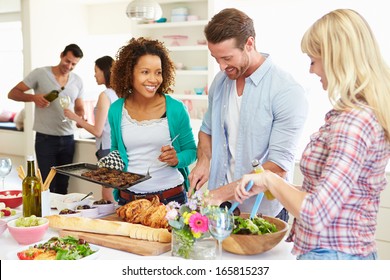 Group Of Friends Having Dinner Party At Home