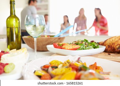 Group Of Friends Having Dinner Party At Home