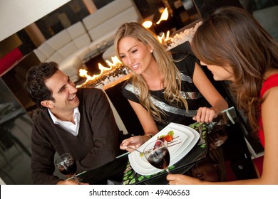 Group Of Friends Having Dinner At A Restaurant