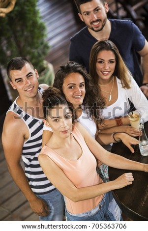 Similar – Group of young people having fun in summer party