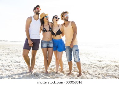 Group Of Friends Having Fun At The Beach