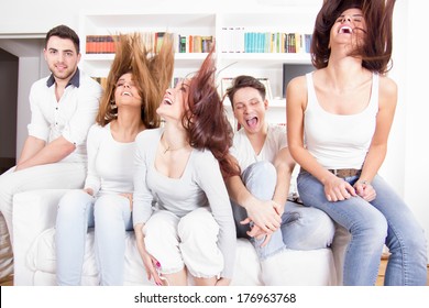 Group Of Friends Having Fun At Home Acting Silly