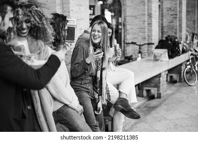 Group Of Friends Having Fun Listening Playlist Music In Boombox Stereo Outdoor - Focus On Center Girl Face - Black And White Editing