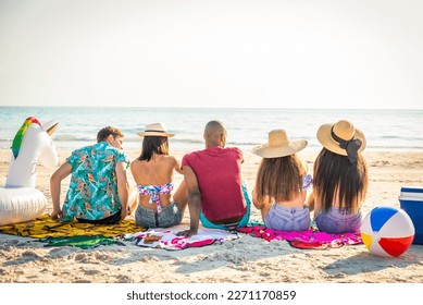 Group of friends having fun on the beach - Young and happy tourists bonding outdoors, enjoying summertime - Powered by Shutterstock