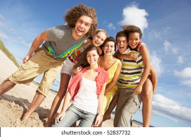 Group Of Friends Having Fun On Summer Beach