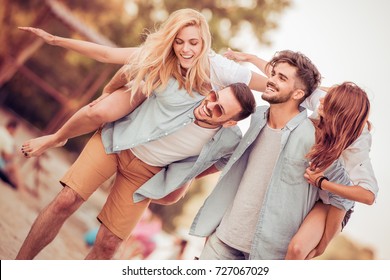 Group Of Friends Having Fun On The Beach.