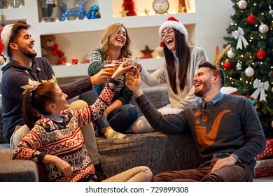 Group Of Friends Having Fun On Christmas Party
