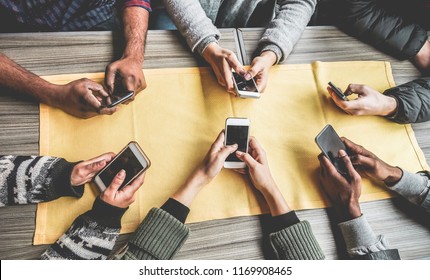 Group Of Friends Having Fun With Smartphones - Closeup Of Hands Social Networking With Mobile Cellphones - Wifi Connected People, Technology, Millennial And Z Generation Concept