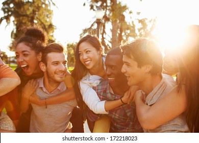 Group Of Friends Having Fun Together Outdoors