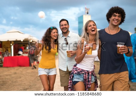 Group of friends having fun together outdoors.
