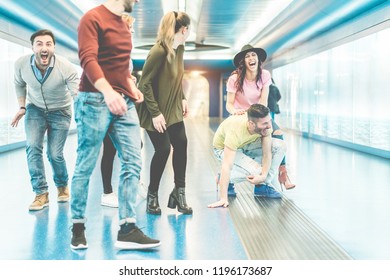 Group Of Friends Having Fun In Underground Metropolitan Station - Young People Hanging Out Ready For Party Night - Friendship And Youth Lifestyle Concept - Focus On Right Girl Face