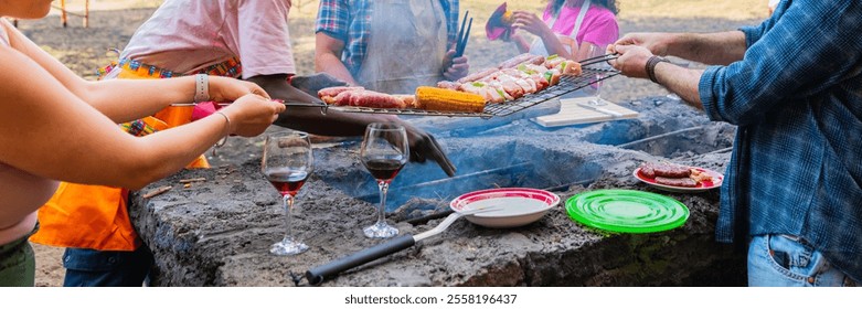 Group friends having party outdoors, focus on barbecue grill with food – multigeneration family grilling outside on backyard in garden party - horizontal web banner size for header   - Powered by Shutterstock