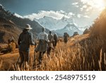 Group of friends hikers walking in mountains enjoying outdoor activities together in Himalayas, Nepal. Travel, outdoor group sport lifestyle concept