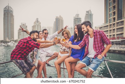 Group Of Friends Making Party On A Yacht In Dubai - Happy People Having A Fancy Party On A Luxury Boat