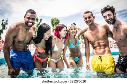 Group Of Friends Making Party In The Pool