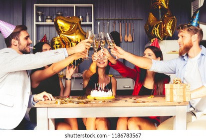 Group Of Friends Making A Toast To Celebrate Birthday