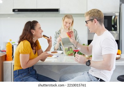 Group Of Friends Meeting And Eating Dessert Together On The Table