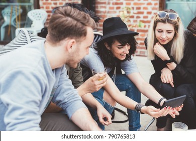 Group Of Friends Millennials Sitting Outdoor Bar Using Smart Phone - Technology, Internet, Happy Hour Concept