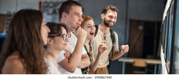 Group Of Friends In Modern Art Exhibition Gallery Hall Contemplating Artwork. Abstract Painting