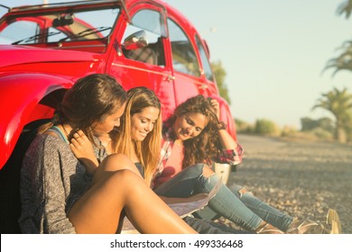 Group Of Friends On A Roadtrip Through Countryside