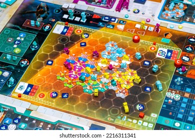 A Group Of Friends Playing Board Games. Detail Plan Of The Game Scenario.