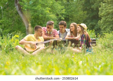 Group Of Friends Playing Music