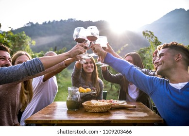 Group Of Friends At Restaurant Outdoors - People Having Dinner In A Home Garden