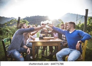 Group Of Friends At Restaurant Outdoors - People Having Dinner In A Home Garden