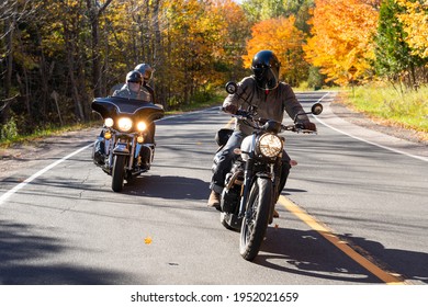 Group of friends riding motorcycles in the fall in Canada - Shutterstock ID 1952021659