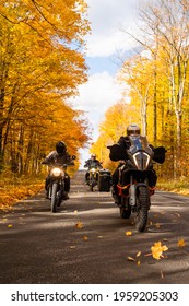 Group of friends riding motorcycles in the fall in Canada - Shutterstock ID 1959205303