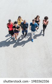 Group Of Friends Runners Running. Top View.