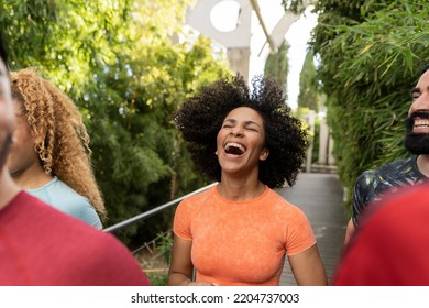 group of friends running, african american woman laughing out loud