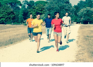 Group Of Friends Running Outside