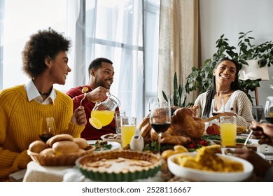 A group of friends shares a warm Thanksgiving dinner, enjoying good food and each other’s company. - Powered by Shutterstock