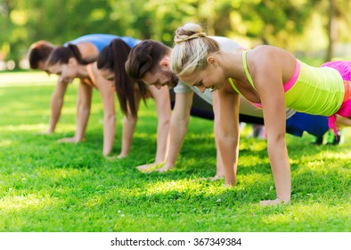 group of friends or sportsmen exercising outdoors - Powered by Shutterstock