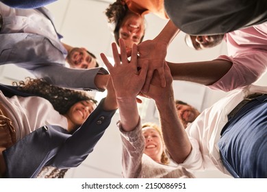 Group Of Friends As A Startup Team Stacking Hands For Team Spirit And Network