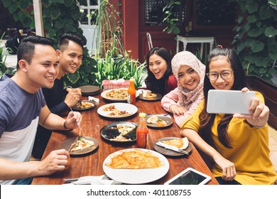 Group Of Friends Taking Selfie During Lunch Outdoors - Powered by Shutterstock