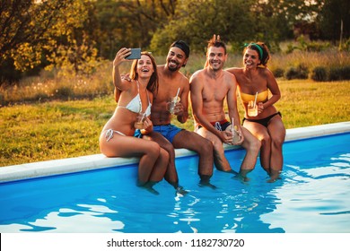 Group Of Friends Talking Selfie At The Poolside