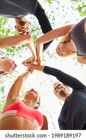 Group Of Friends In Team Building Class Giving The High Five For Motivation And Team Spirit